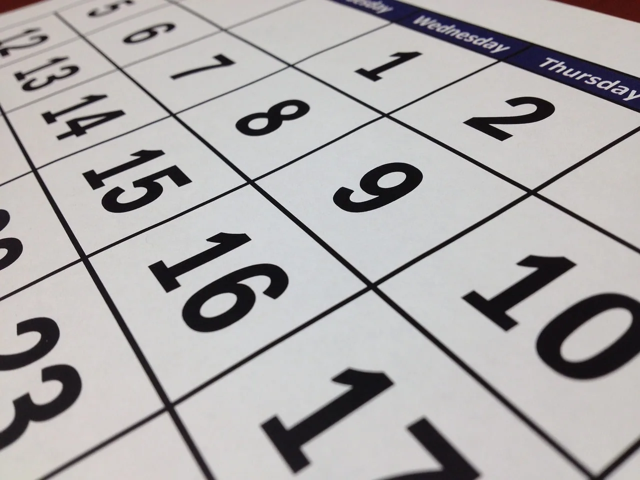 A calendar showing auction dates
