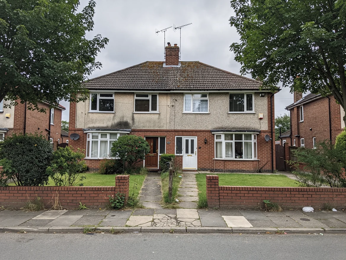 A typical British 1930s suburban semi-detached house with mature front garden, photographed from across the street - the kind of family home owners often consider selling at auction