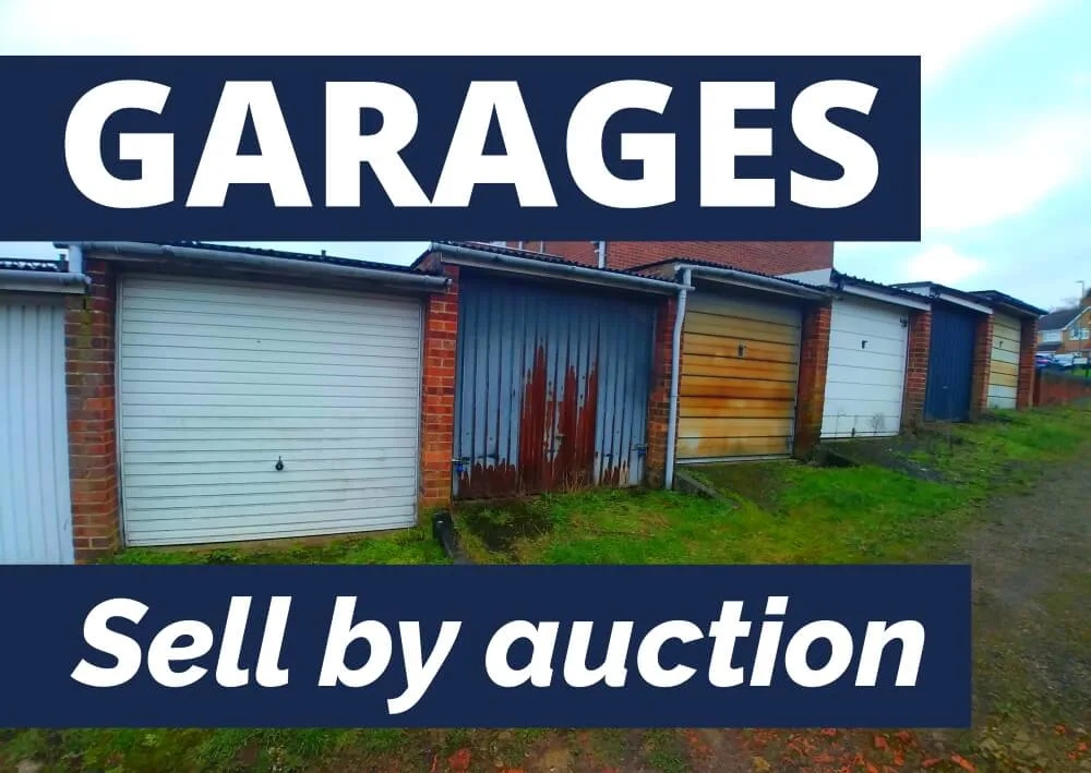 Selling a garage by auction - a row of lock-up garages
